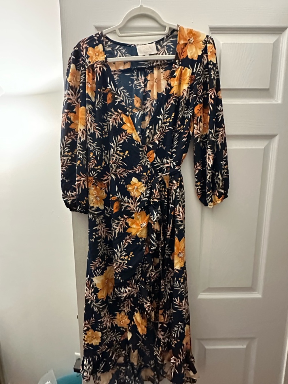 Francesca’s Floral Long Sleeve Wrap dress.